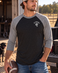 The Brand Baseball Tee in Premium Heather/Vintage Black — male model, front view