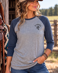The Brand Baseball Tee in Vintage Navy/Premium Heather — female model, front view