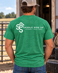 The Brand Tee in Heathered Kelly Green — male model, back view