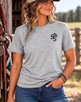 The Brand Tee in Light Heather Grey — female model, front view