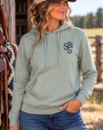 Western Freedom Hoodie in Dusty Sage — female model, front view