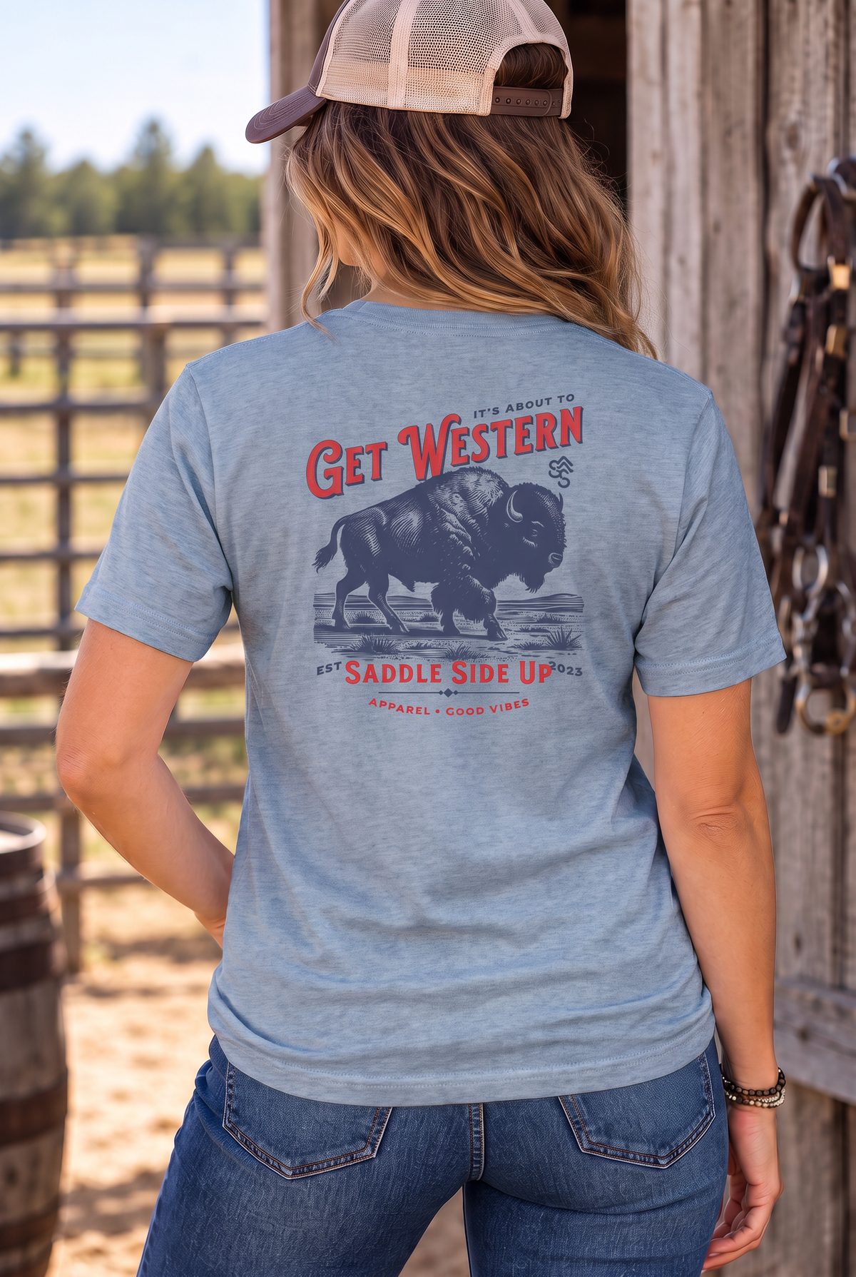 Bison Tee in Flint Blue Heather — female model, back view