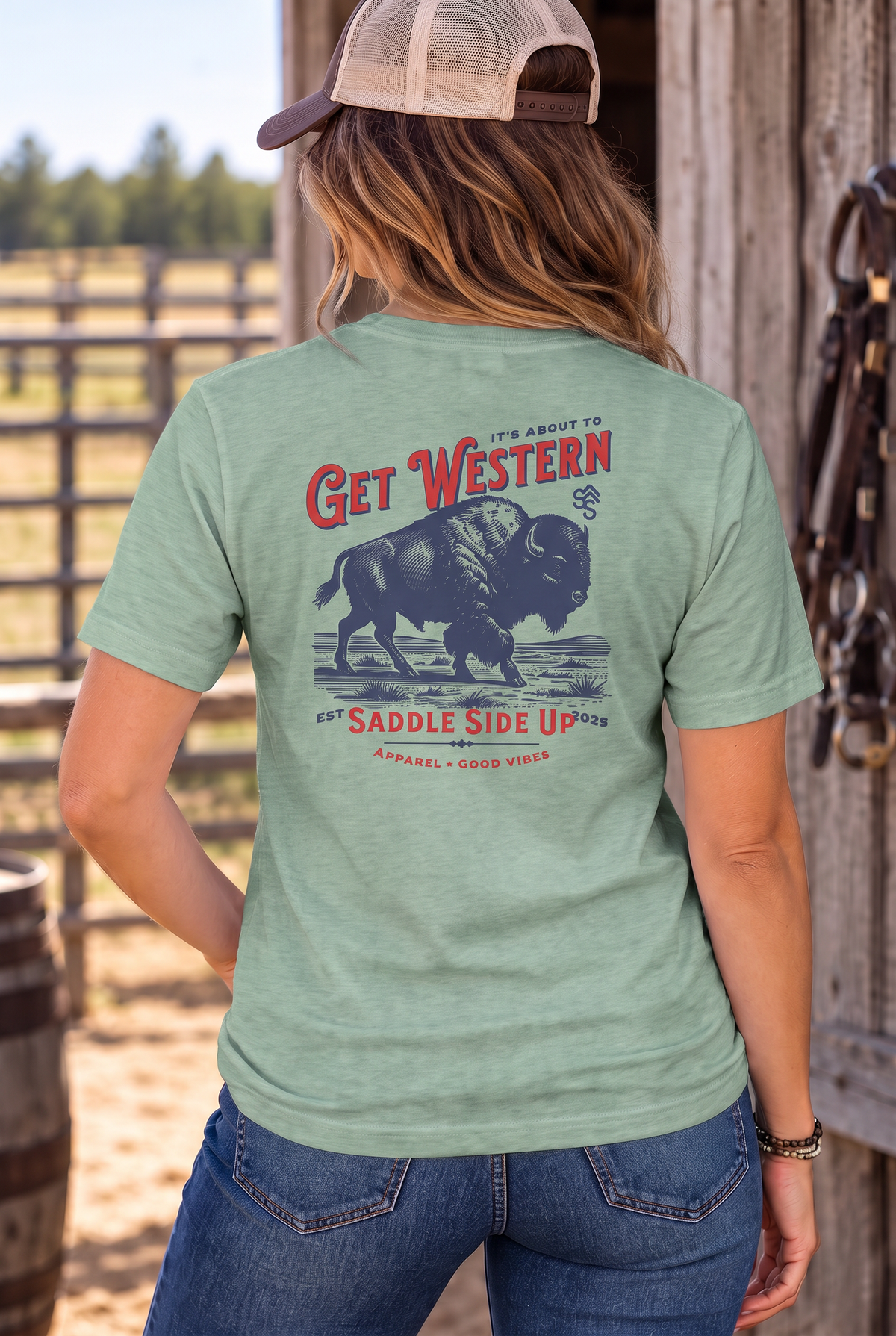 Bison Tee in Heathered Dusty Sage — female model, back view