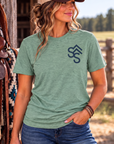 Bison Tee in Heathered Dusty Sage — female model, front view