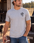 Bison Tee in Light Heather Grey — male model, front view