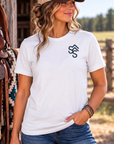 Bison Tee in White — female model, front view