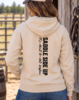 Get Western Hoodie in Sand — female model, back view