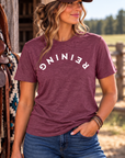 Reining Tee in Heather Maroon — female model, front view