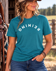 Reining Tee in Tropical Blue — female model, front view