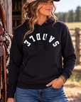 Saddle Hoodie in Black — female model, front view