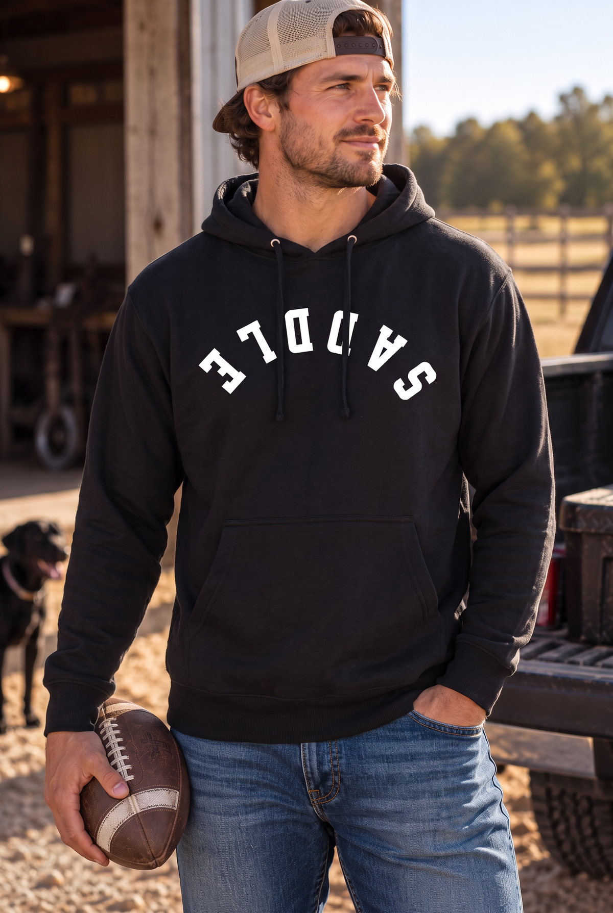 Saddle Hoodie in Black — male model, front view