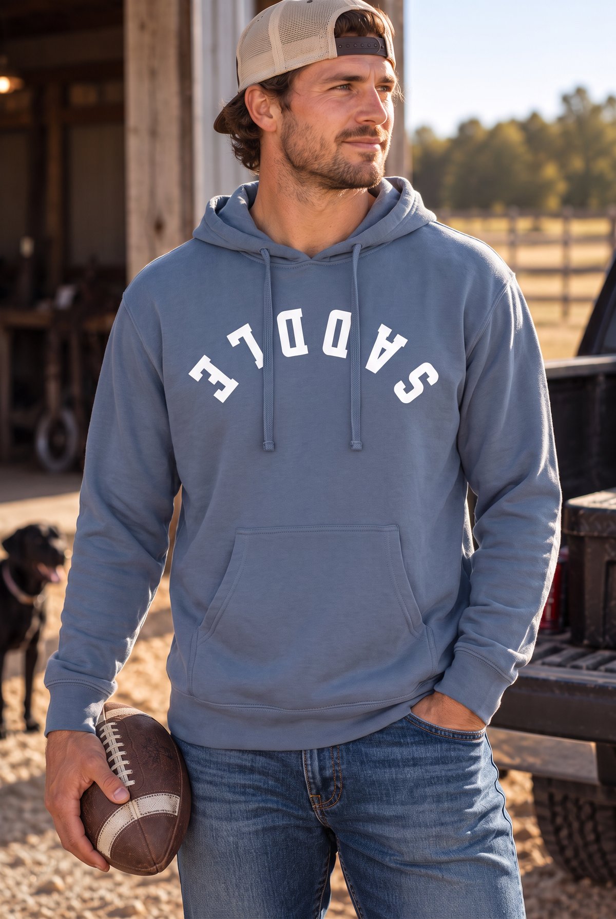 Saddle Hoodie in Storm Blue — male model, front view
