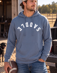 Saddle Hoodie in Storm Blue — male model, front view