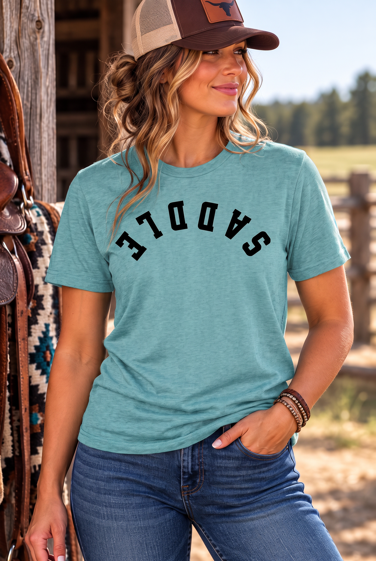 Saddle Tee in Heathered Eucalyptus Blue — female model, front view