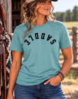 Saddle Tee in Heathered Eucalyptus Blue — female model, front view