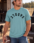 Saddle Tee in Heathered Eucalyptus Blue — male model, front view