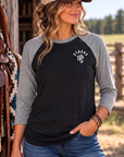 The Brand Baseball Tee in Premium Heather/Vintage Black — female model, front view