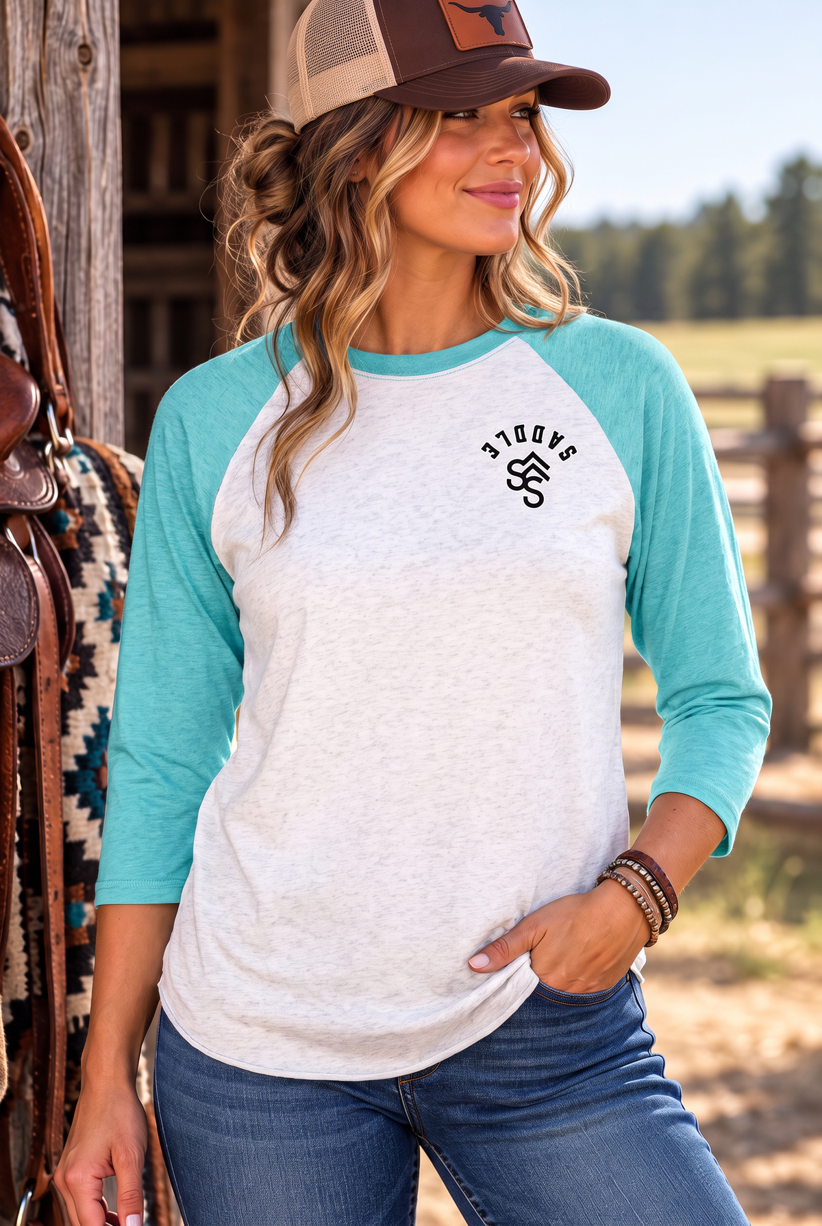 The Brand Baseball Tee in Tahiti Blue/Heather White — female model, front view