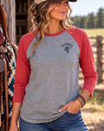 The Brand Baseball Tee in Vintage Red/Premium Heather — female model, front view