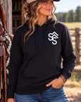 The Brand Hoodie in Black — female model, front view