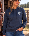 The Brand Hoodie in Classic Navy Heather — female model, front view