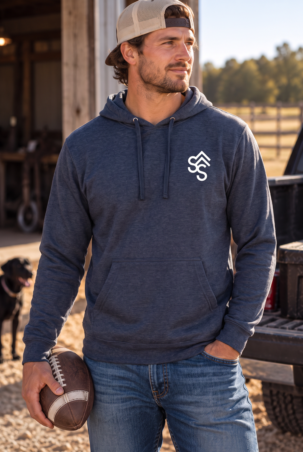 The Brand Hoodie in Classic Navy Heather — male model, front view