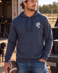 The Brand Hoodie in Classic Navy Heather — male model, front view
