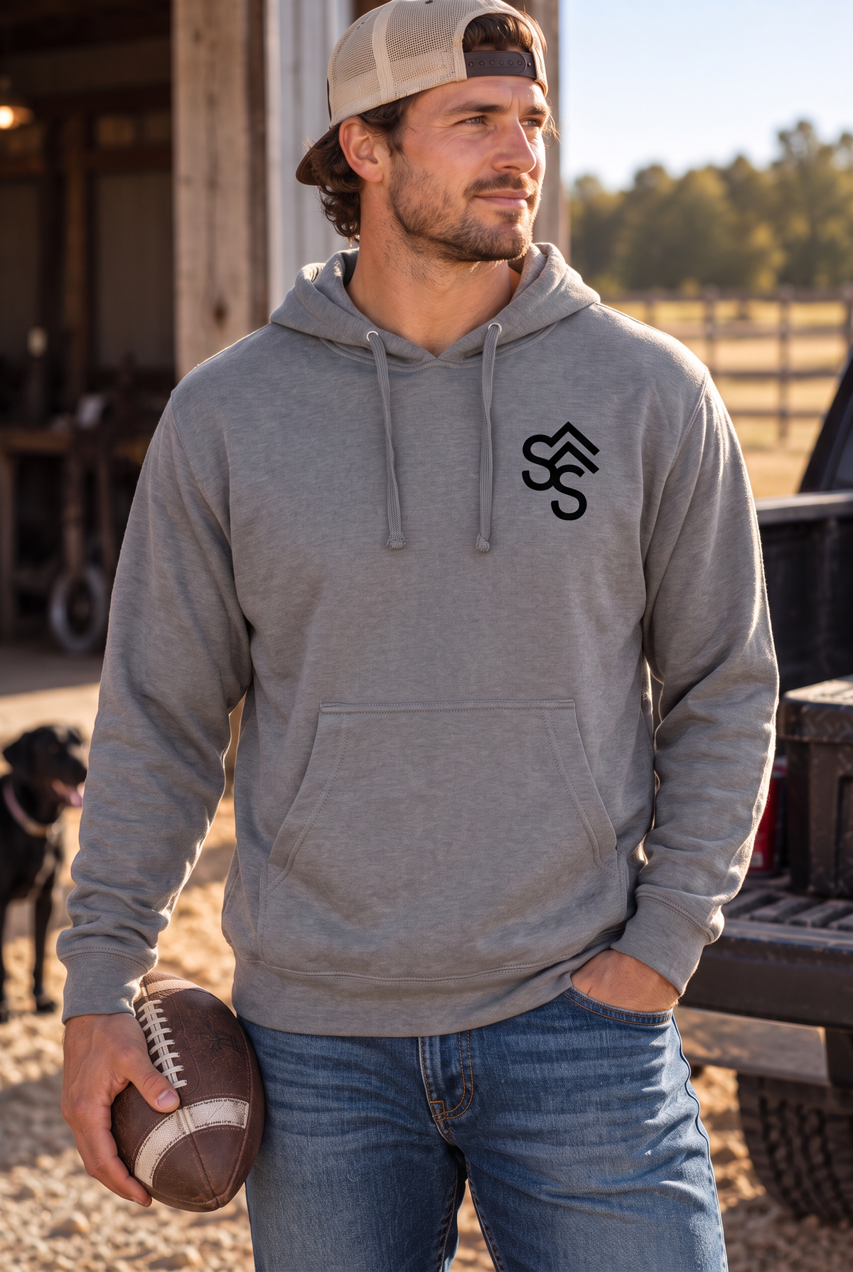 The Brand Hoodie in Gunmetal Heather — male model, front view