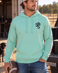 The Brand Hoodie in Mint — male model, front view