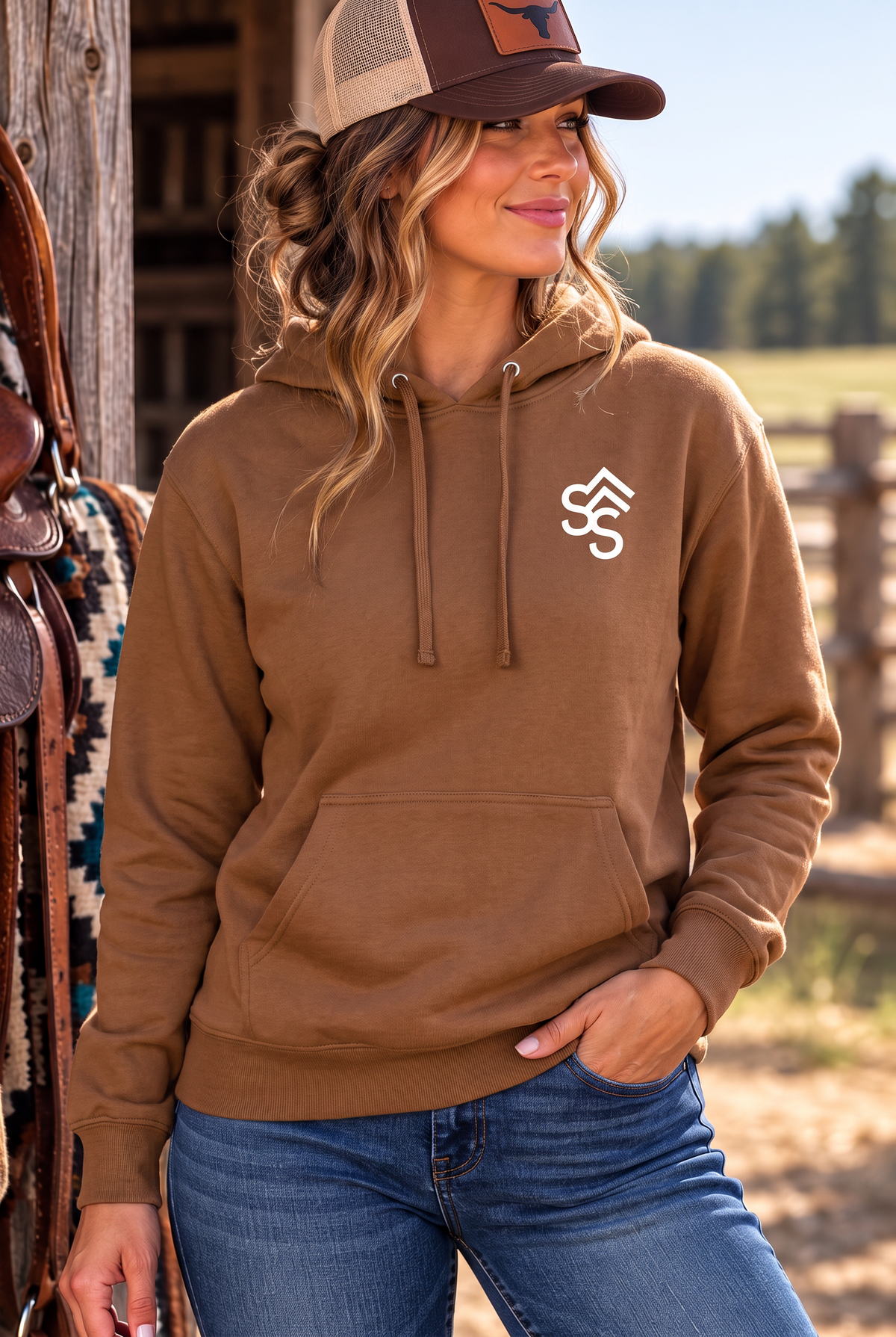 The Brand Hoodie in Saddle — female model, front view
