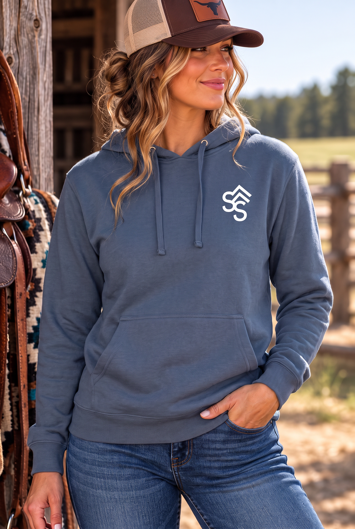 The Brand Hoodie in Storm Blue — female model, front view
