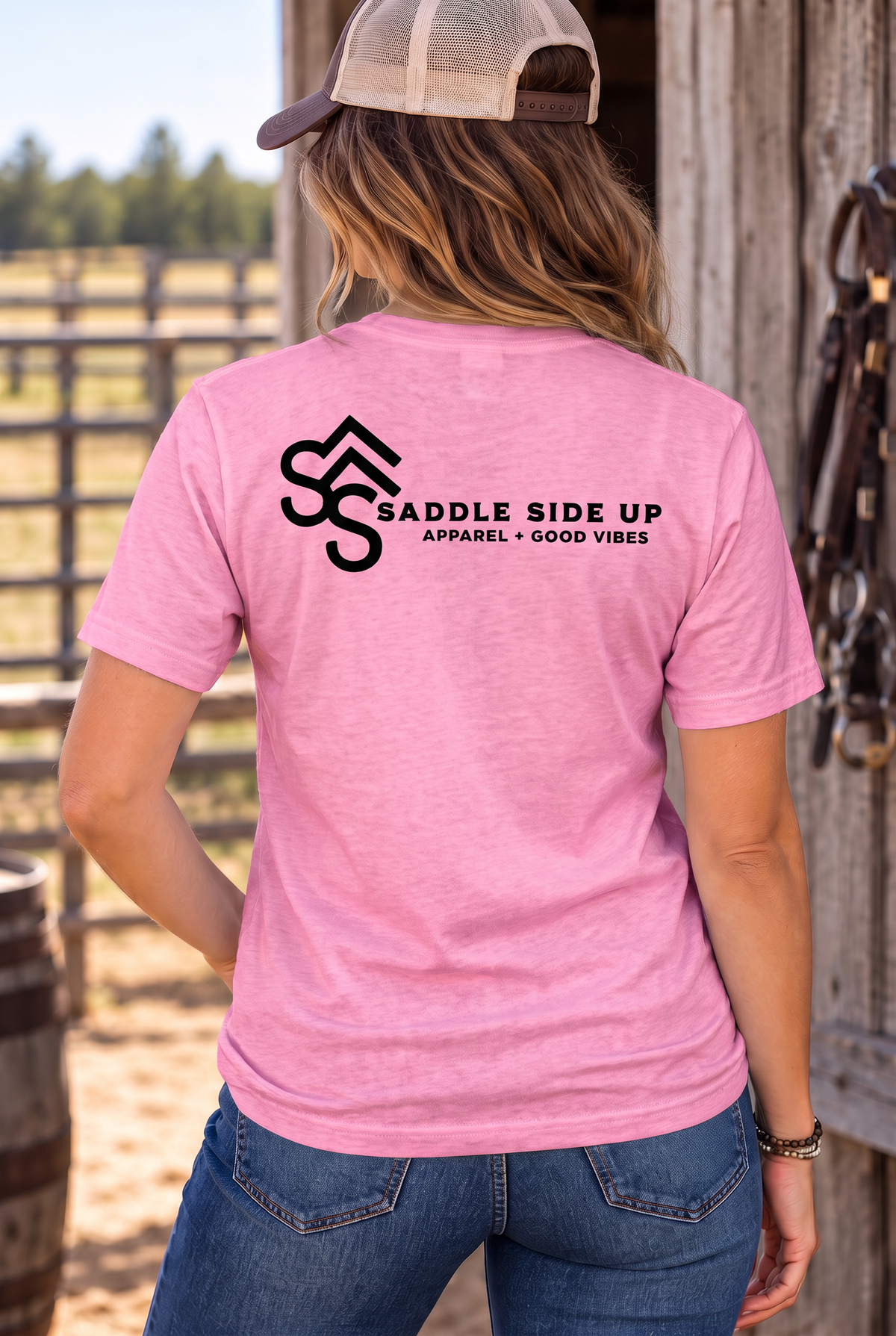 The Brand Tee in Awareness Pink Heather — female model, back view