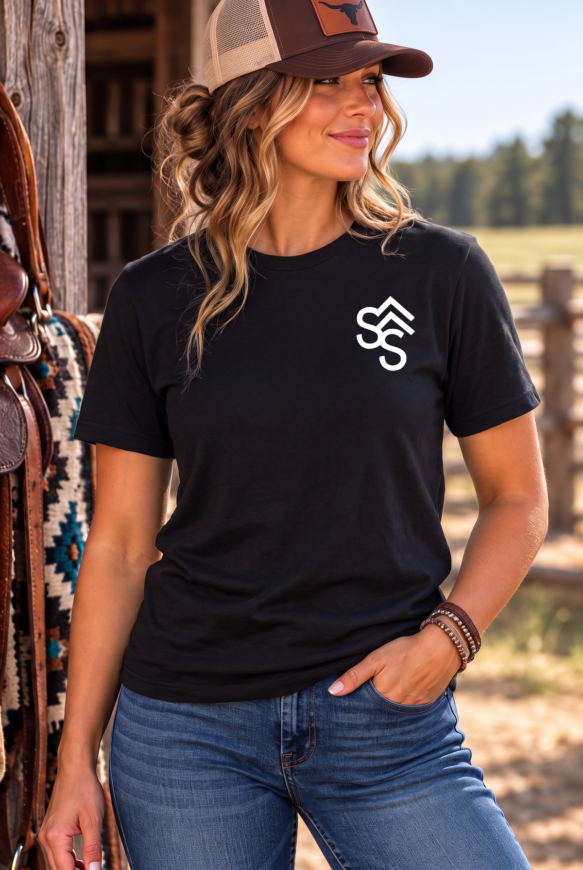 The Brand Tee in Black — female model, front view