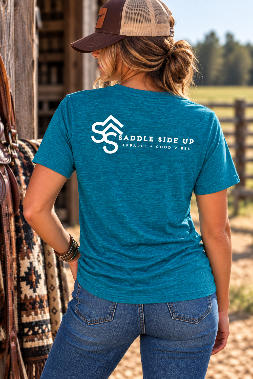 The Brand Tee in Deep Turquoise Fleck — female model, back view