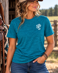 The Brand Tee in Deep Turquoise Fleck — female model, front view