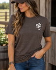 The Brand Tee in Heathered Brown — female model, front view