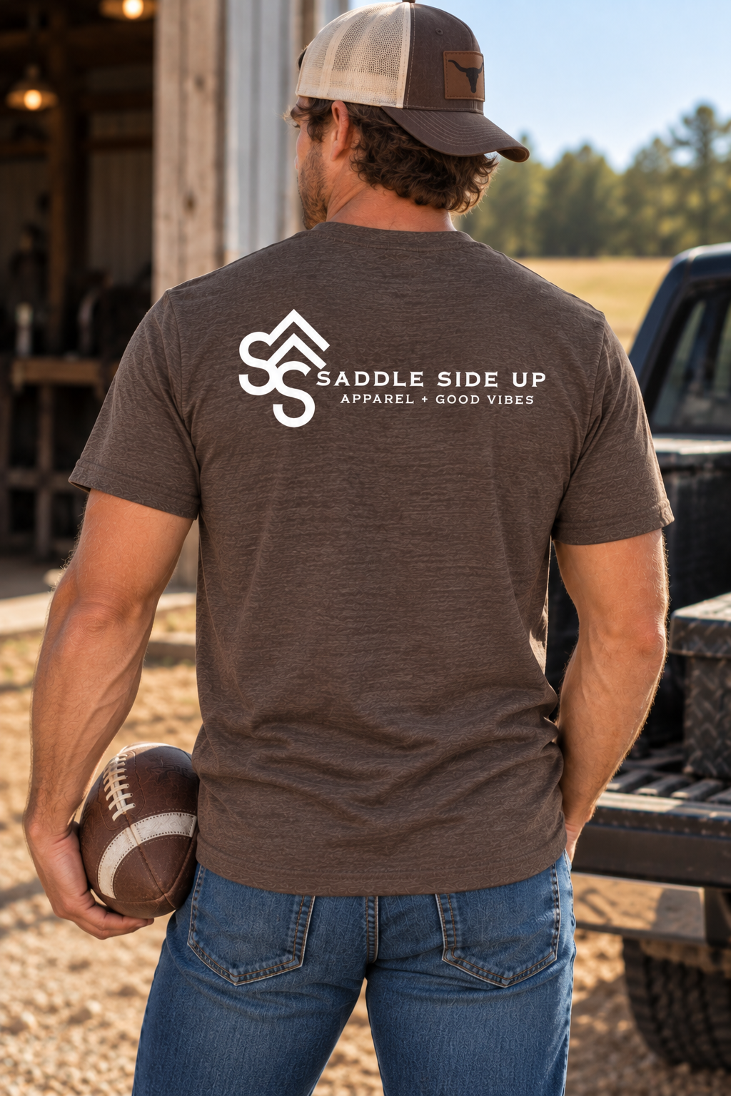 The Brand Tee in Heathered Brown — male model, back view