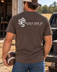The Brand Tee in Heathered Brown — male model, back view
