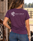 The Brand Tee in Heathered Eggplant — female model, back view