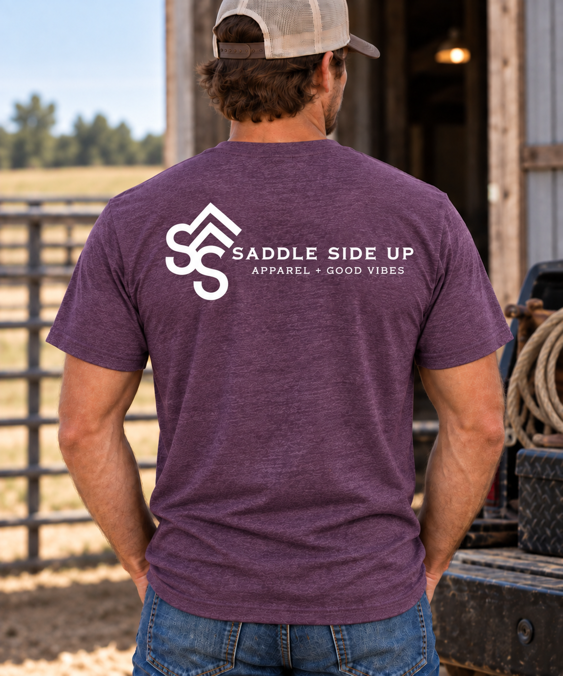 The Brand Tee in Heathered Eggplant — male model, back view