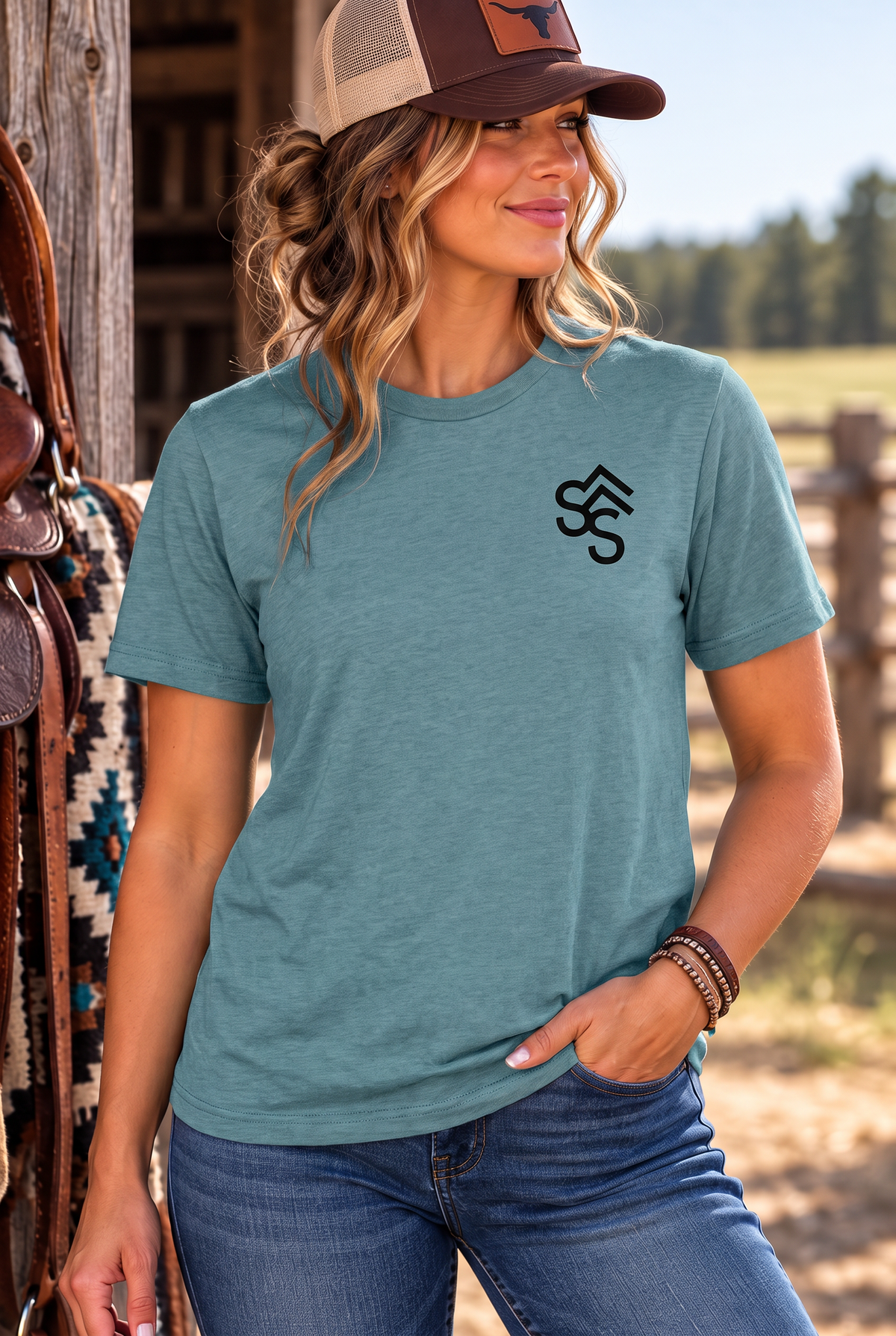 The Brand Tee in Heathered Eucalyptus Blue — female model, front view