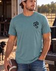 The Brand Tee in Heathered Eucalyptus Blue — male model, front view