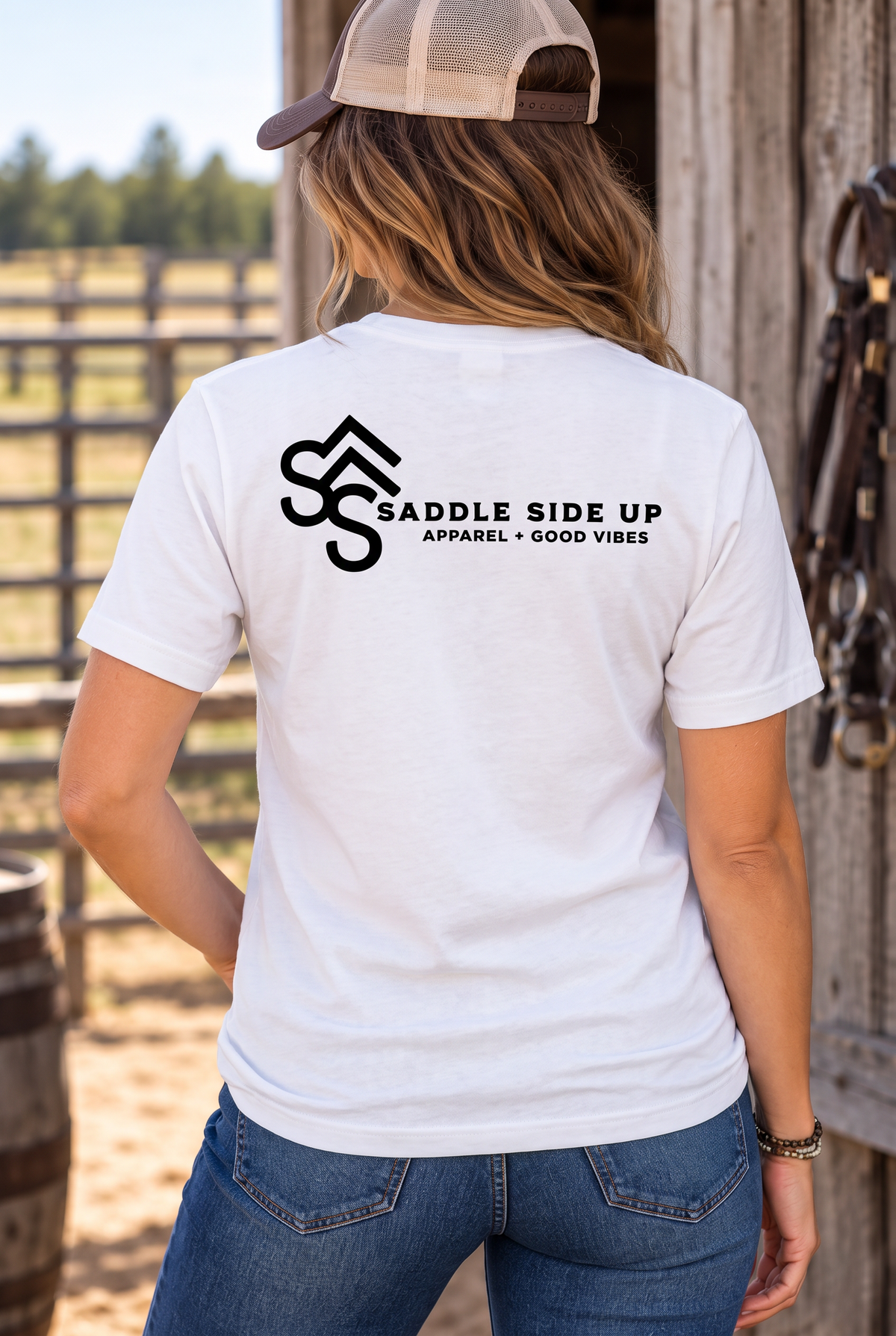 The Brand Tee in White — female model, back view