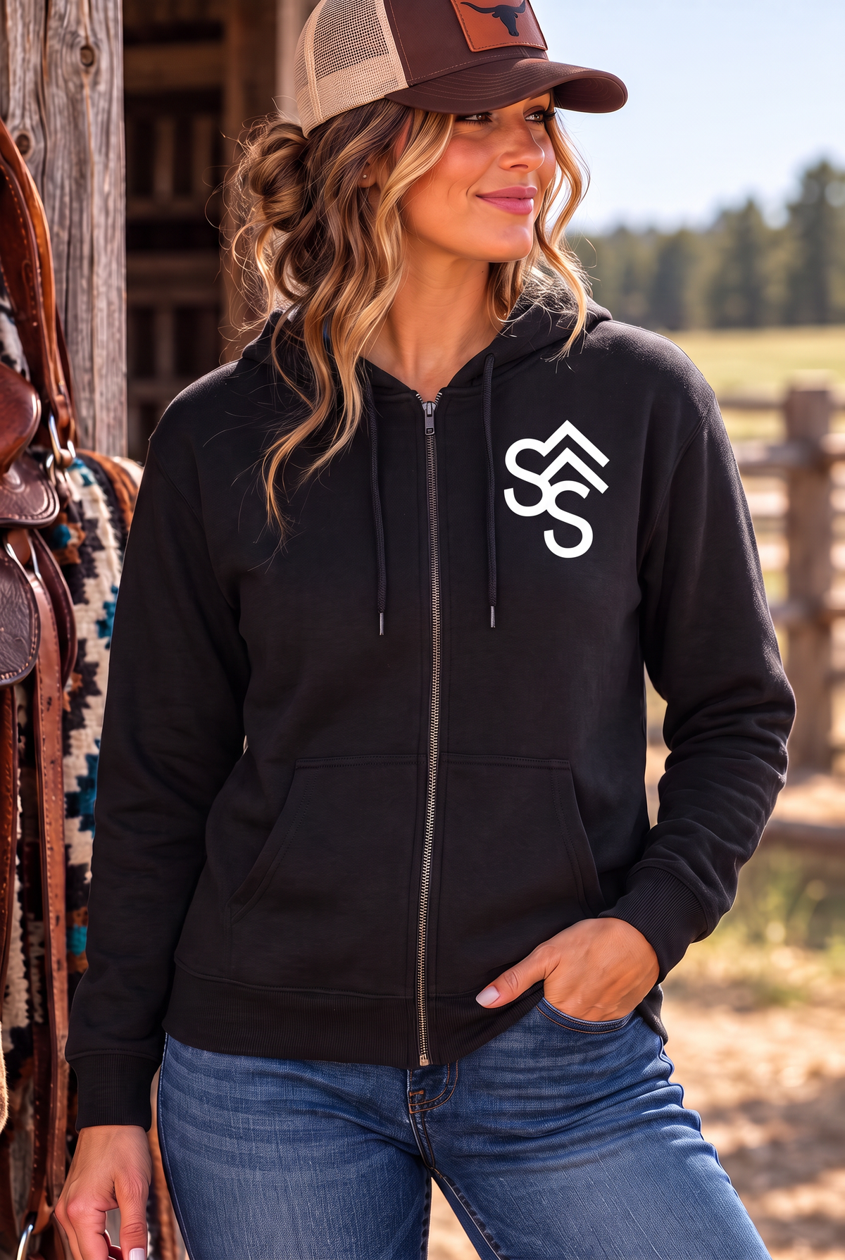 The Branded Zip in Black — female model, front view