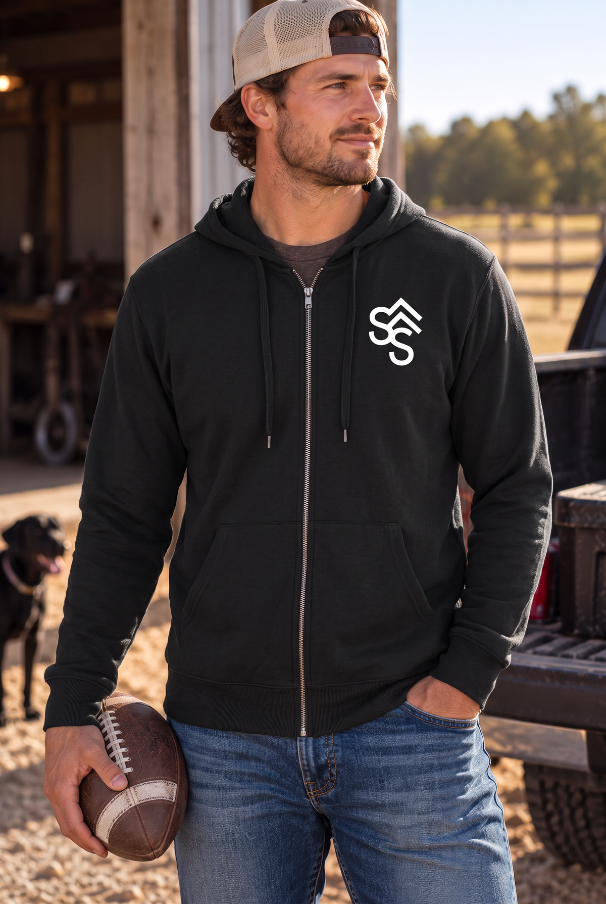 The Branded Zip in Black — male model, front view