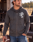 The Branded Zip in Heathered Charcoal — male model, front view