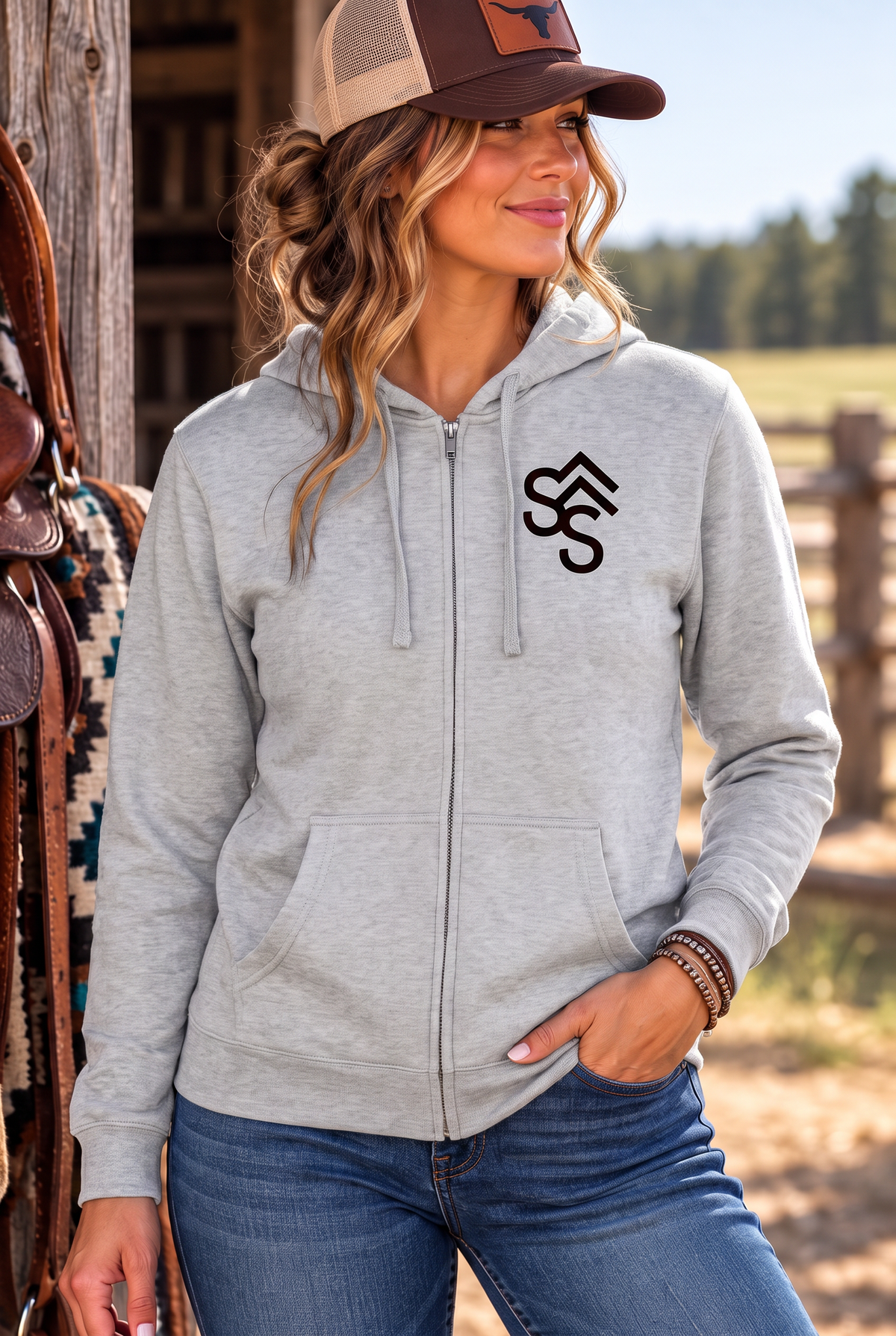 The Branded Zip in Light Heather Grey — female model, front view