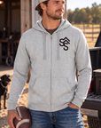 The Branded Zip in Light Heather Grey — male model, front view