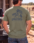 Western Freedom Tee in Heathered Olive — male model, back view